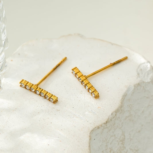 BIHAR: Minimalist Pavé Zirconia Embedded Bar Stud Earrings in Gold.