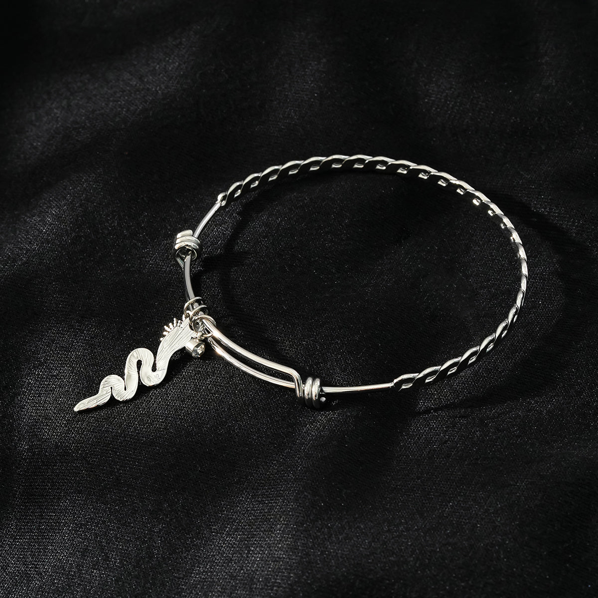 CATALINA White Gold (Silver Toned): Bracelet with Serpent, Sun Symbol and Zirconia (CZ) Charms.