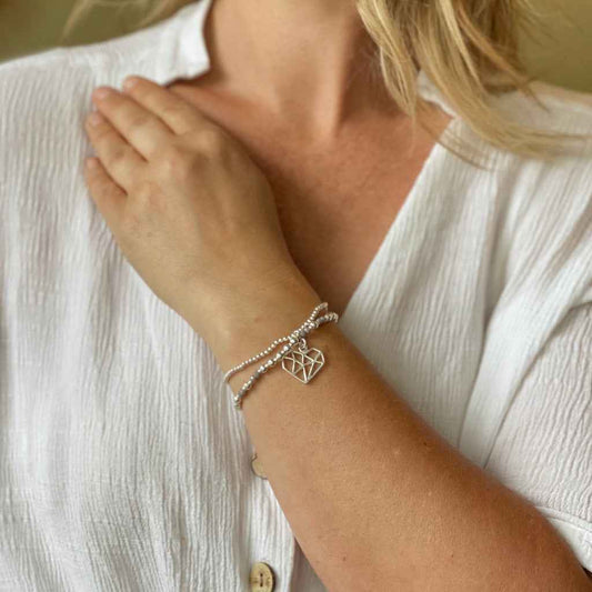 Double Strand Bracelet With Heart Pendant In Silver Plate
