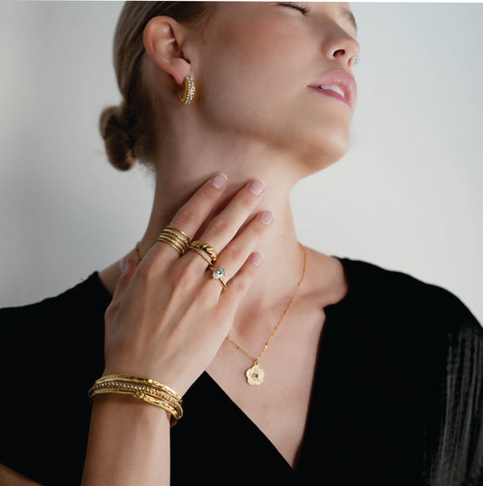 BELLINA Gold: Triple Stacked Textured Bracelet Zirconia (CZ) Embedded Tennis Bracelet at Centre. Stacked for Glamour.