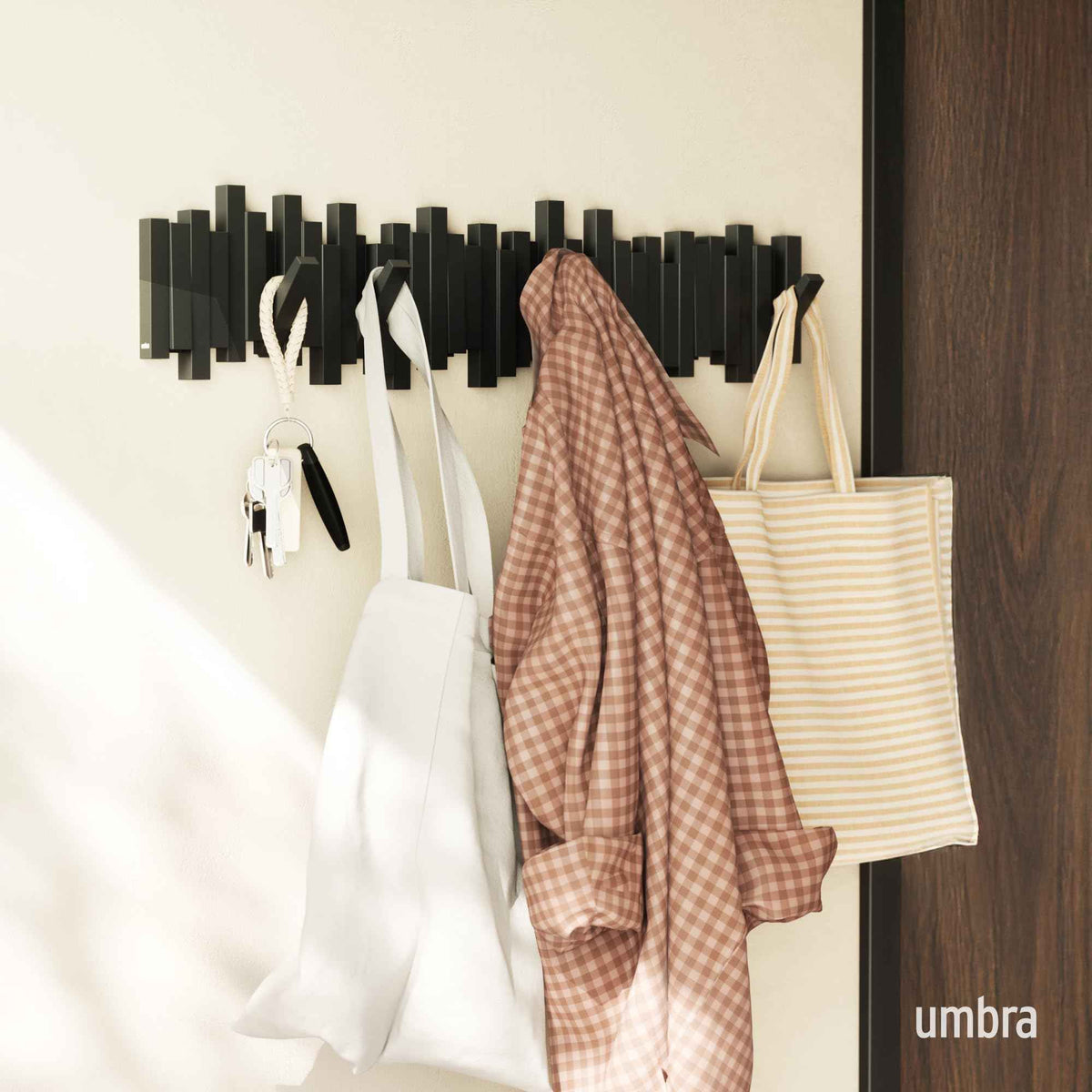 Umbra Sticks Wall-Mounted Coat Rack Rail Hook with 8 Retractable Pegs – Modern, Space-Saving Storage Organizer, Black 🍁 All In One Marketplace Canada