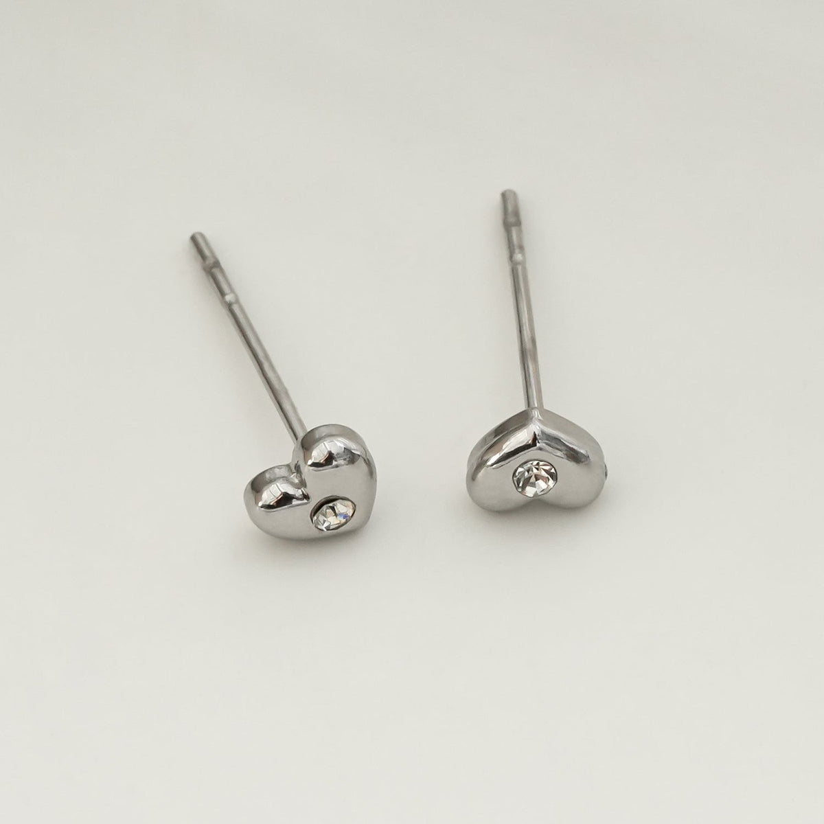 ADORE: Puffy Silver Heart Shaped Solitaire Zirconia (CZ) Stud Earrings