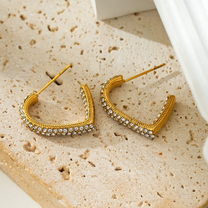 Style ANJAR Gold: Heart Shaped Hoops embedded with Zirconia Gemstones