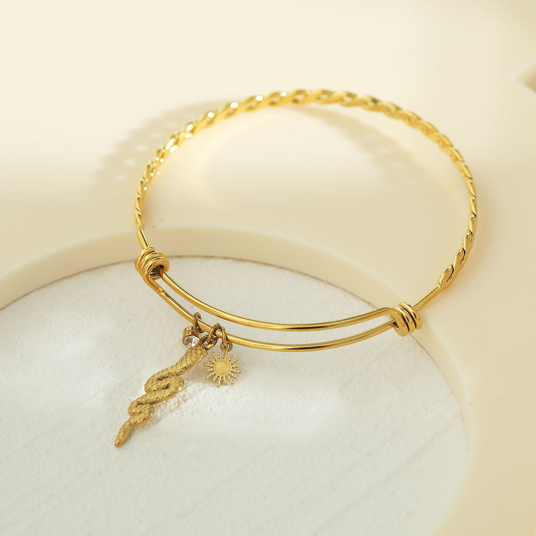 CATALINA Gold: Bracelet with Serpent, Sun Symbol and Zirconia (CZ) Charms