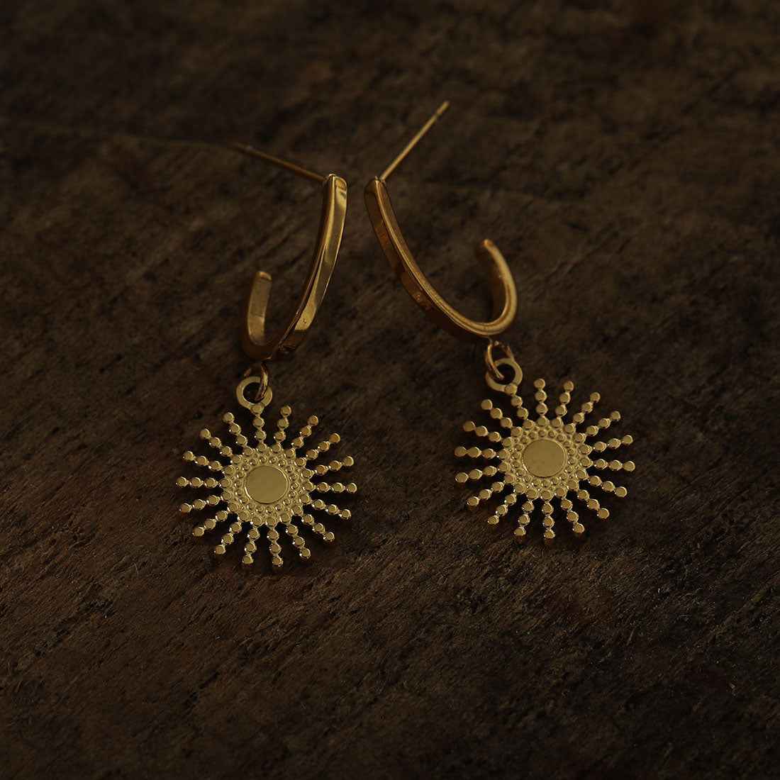 CHARLIE Gold: Semi Hoops with a Sun Symbol Charm