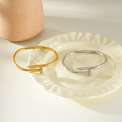 DAVIDKA Gold: Zirconia Embedded Industrial-Chic Twisted Nail Bracelet