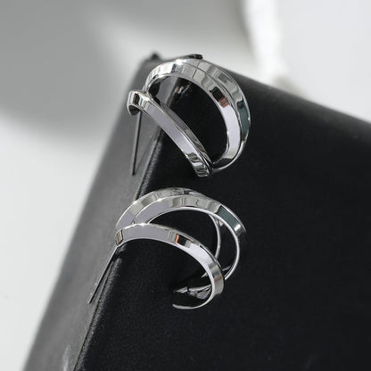 GRIZZANA: Triple Banded Hoop Earrings in Silver