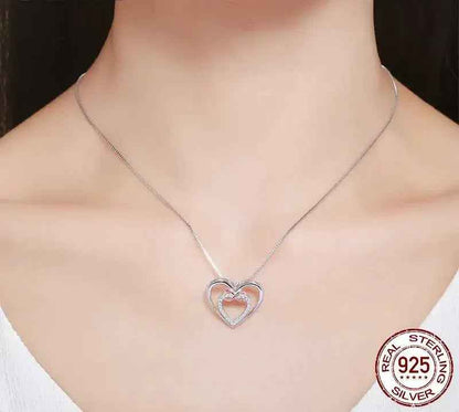 Entwined Hearts: Sterling Silver Infinity Necklace With Double Hearts