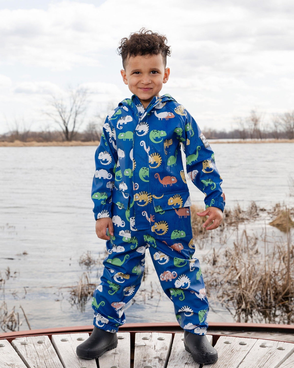 Blue rain jumpsuit with color-changing chameleon print