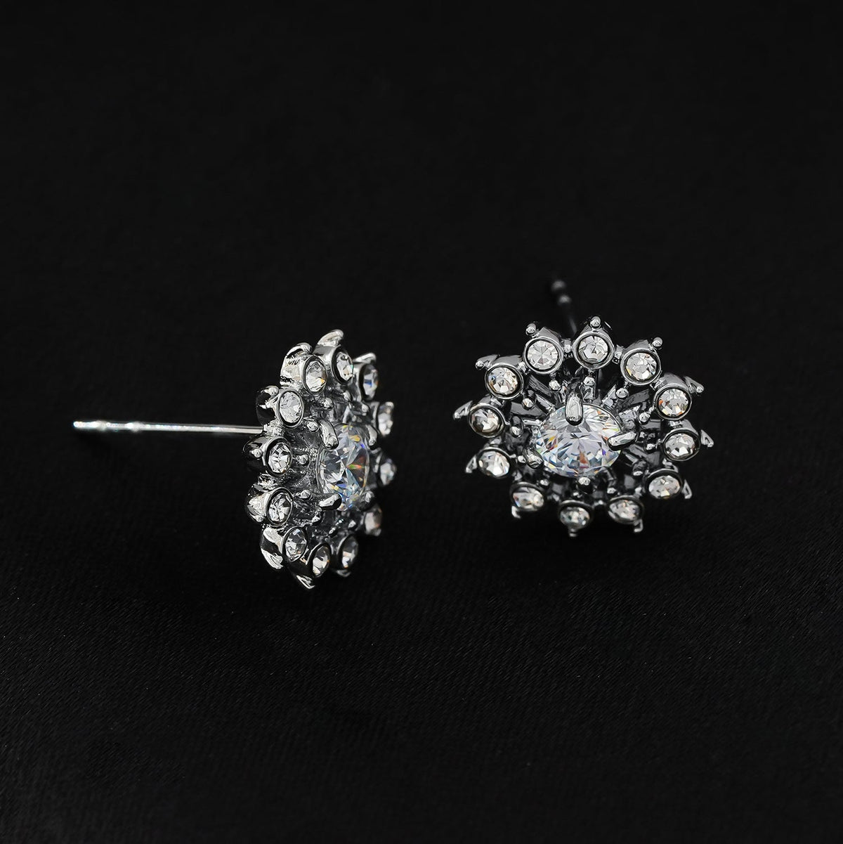 KERELA White Gold (Silver Toned): Shimmering Star Zirconia Stud Earrings