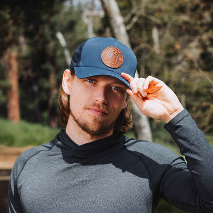 Winding Wilderness Leather Patch Trucker Hat