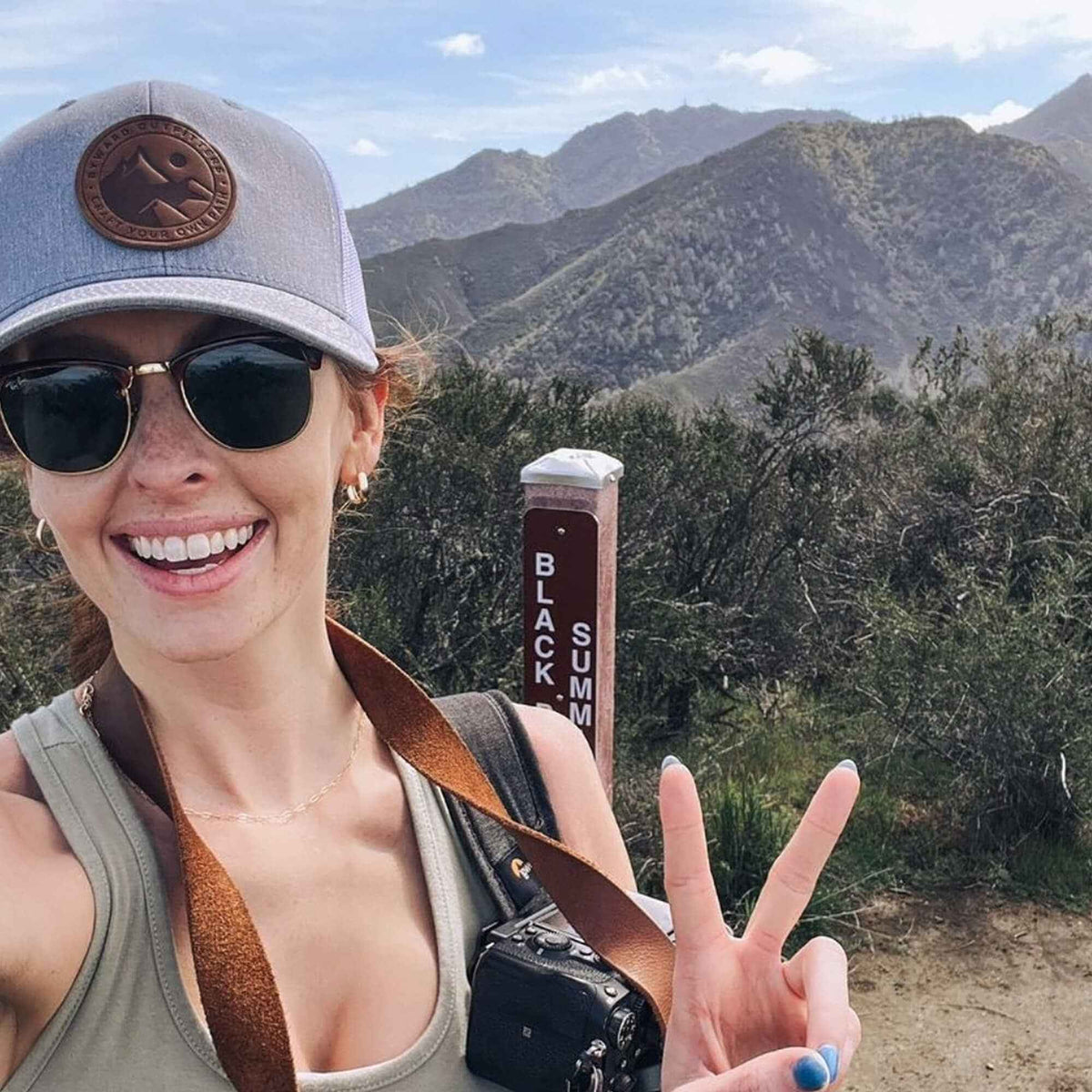 Mountain Escape Leather Patch Trucker Hat