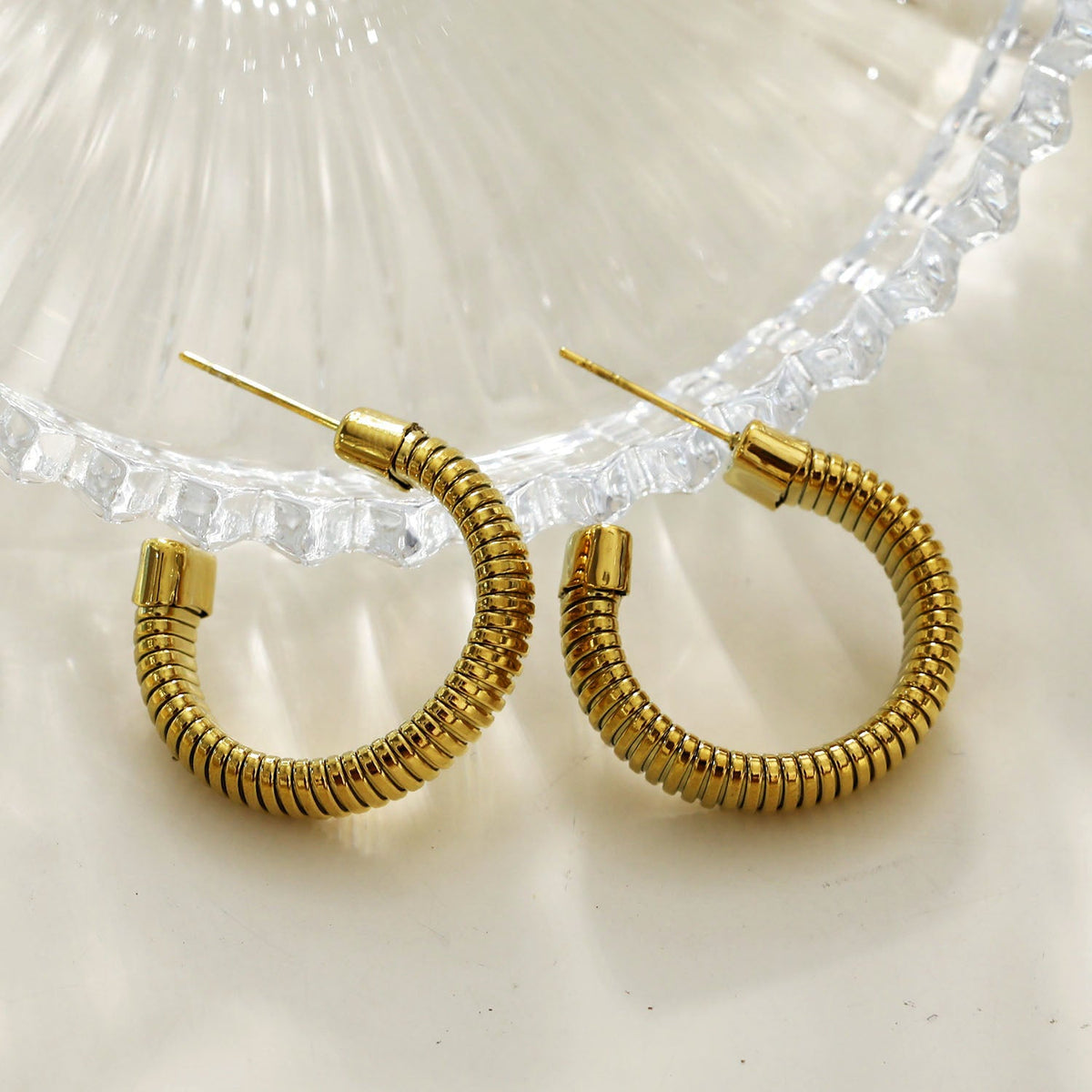 Style ABRIOLA: Textured Geometric Hoop Earrings