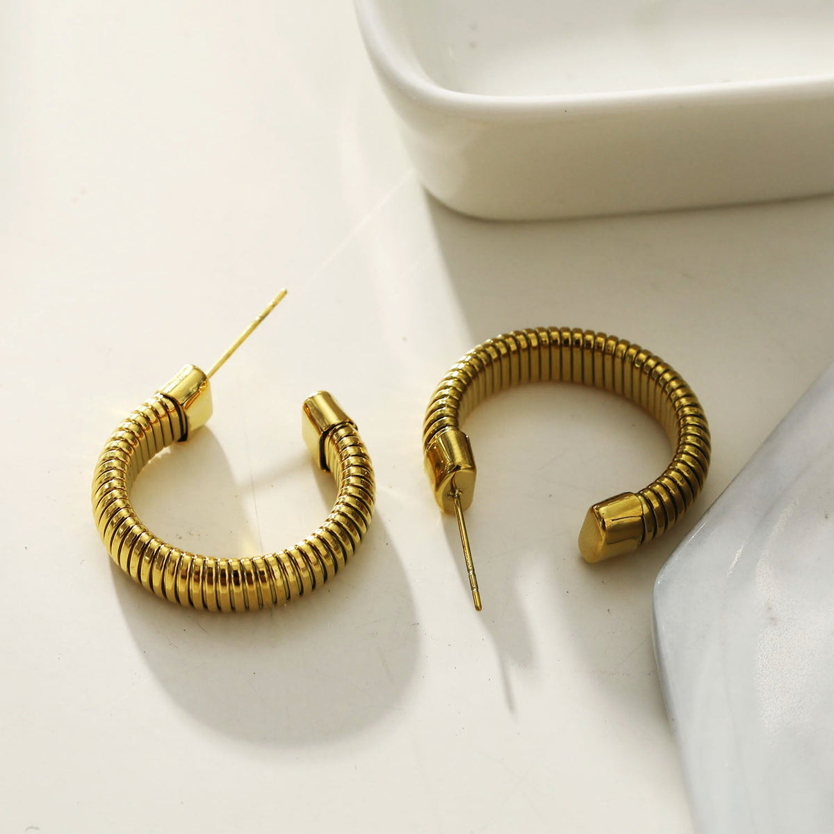 Style ABRIOLA: Textured Geometric Hoop Earrings