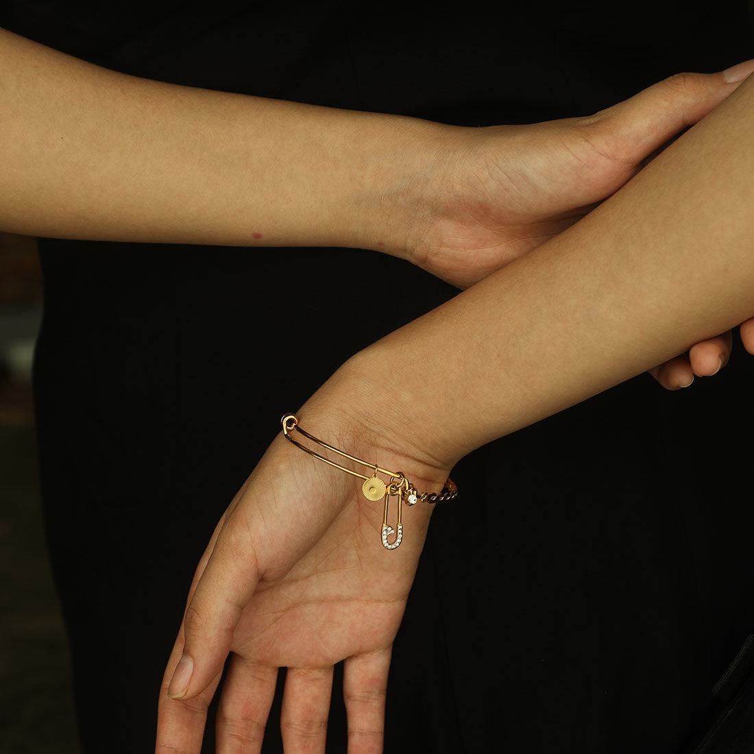 CHRISTINA: Charms Adorned Gold Bracelet