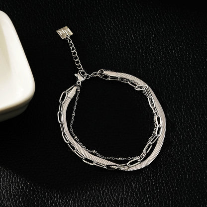 REINEDA: Triple Stacked White Gold (Silver Toned) Bracelet