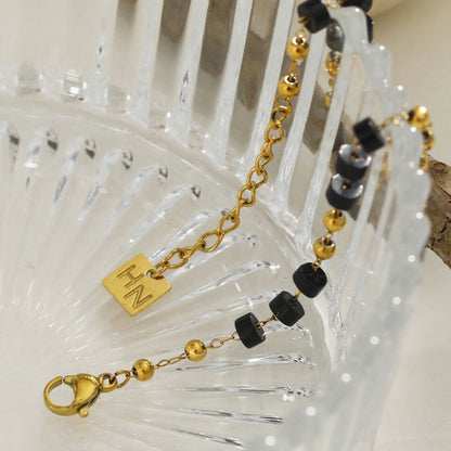 ROSARIO: Black Onyx and Gold Beaded Chain Bracelet