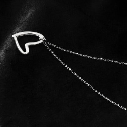SMITTEN Silver (White Gold): Dainty Beaded Chain Anchoring an Abstract Heart Shaped Pendant