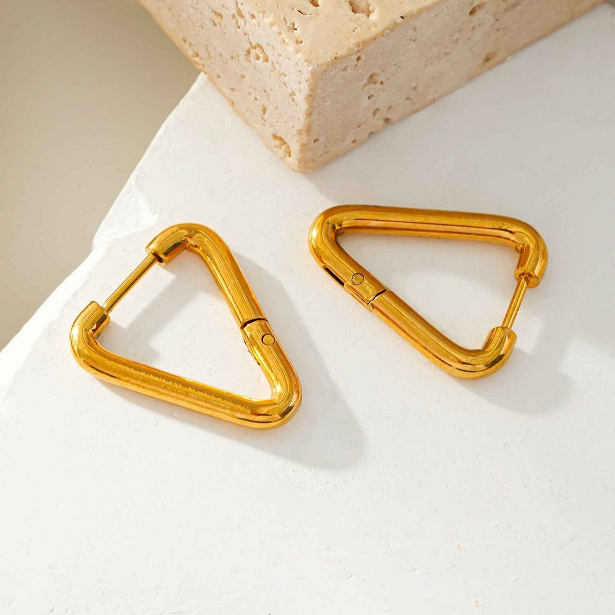 TRILO Gold: Modern Triangle Hoop Earrings - A Bold Twist on Classic Elegance